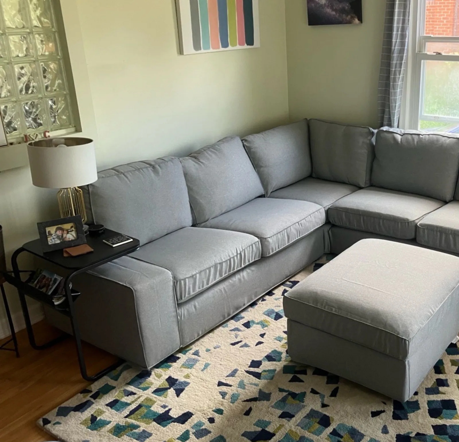 living room gray sectional — cleaned by Verde Luxe Cleaning