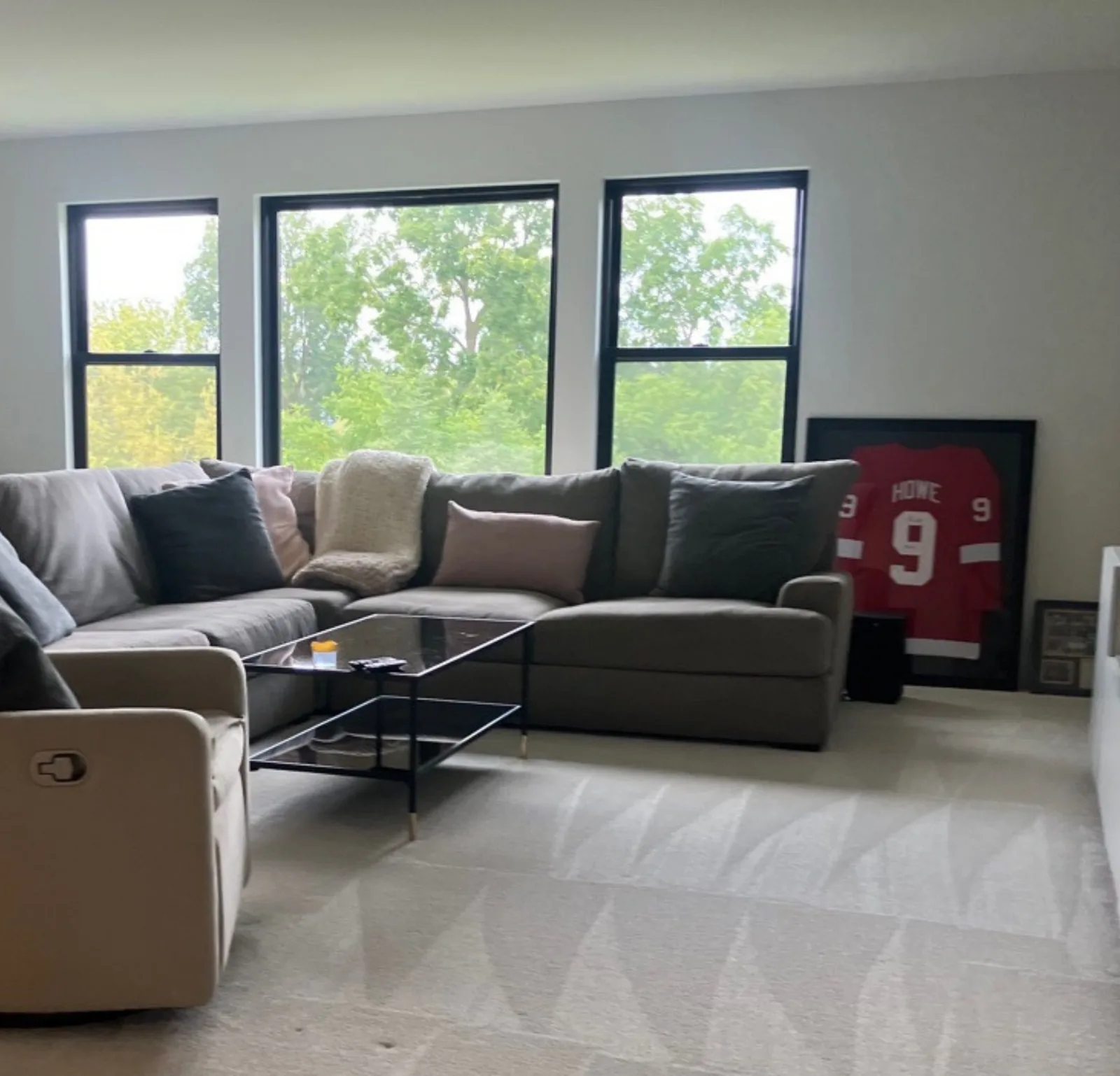 living room sectional bay windows — cleaned by Verde Luxe Cleaning